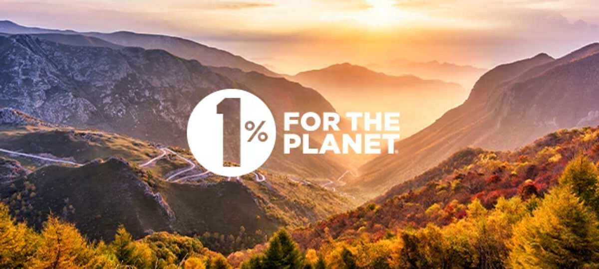 1% for the Planet logo on a background image of mountain sunset 1% for the Planet logo on a background image of mountain sunset