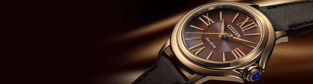 Women's Citizen L Ceci watches; Featuring Citizen L Ceci watch model EM1163-09X on a chocolate background