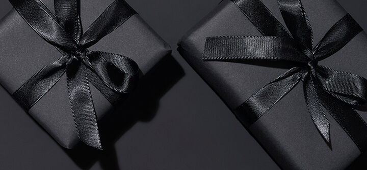 Gifts with purchase banner image featuring gift boxes