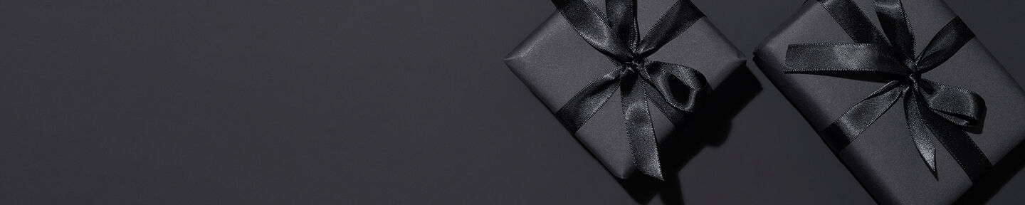 Gifts with purchase banner image featuring gift boxes